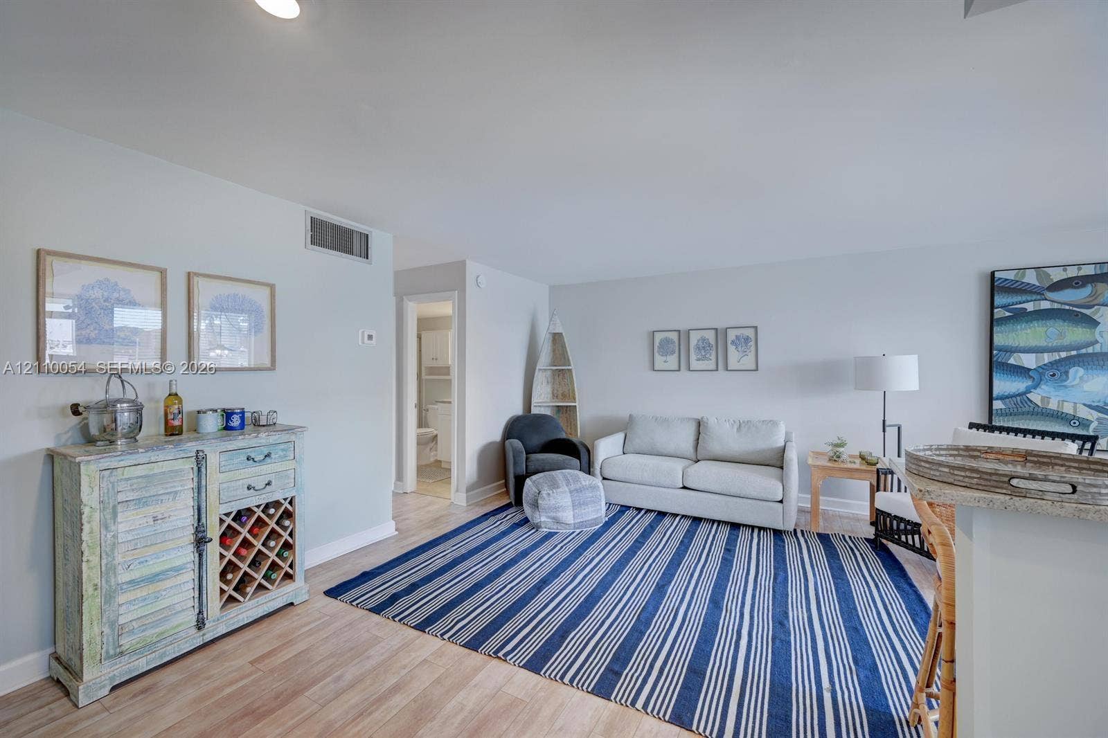 Interior space featuring wood-finish flooring and recessed lighting