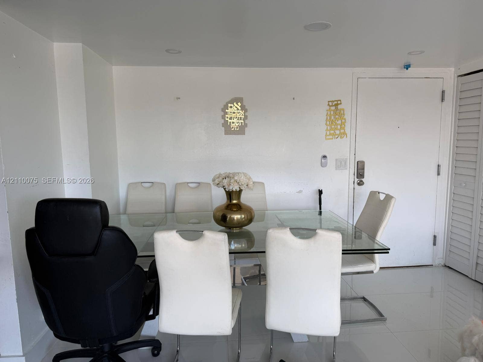 2017 S Ocean Drive, #208, Hallandale Beach, Hallandale Beach, FL 33009 Interior room featuring polished tile flooring, recessed ceiling lighting, and louvered closet doors