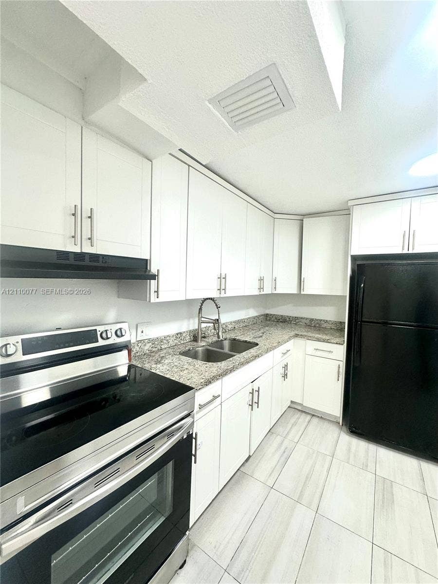 Property photo for 447 NE 195th Street, #214, Miami, FL