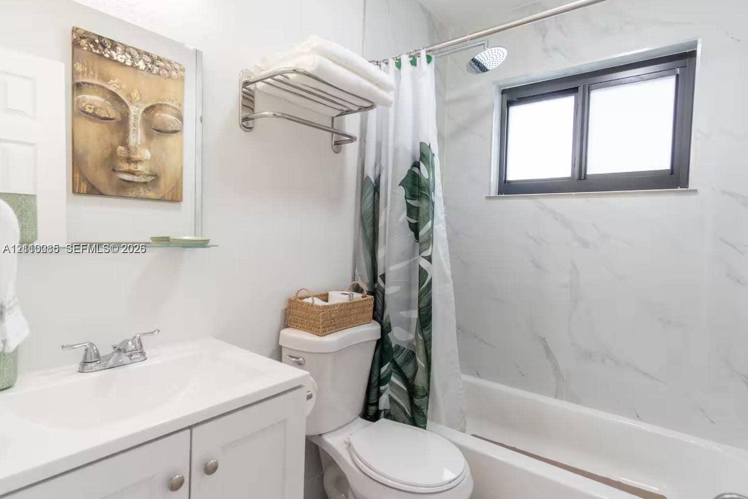 7815 NW 5th Court, #1, Miami, Miami, FL 33150 Bathroom featuring white vanity cabinetry, integrated sink, polished chrome faucet, wall-mounted towel rack, and tub-shower combination with light-toned wall tile