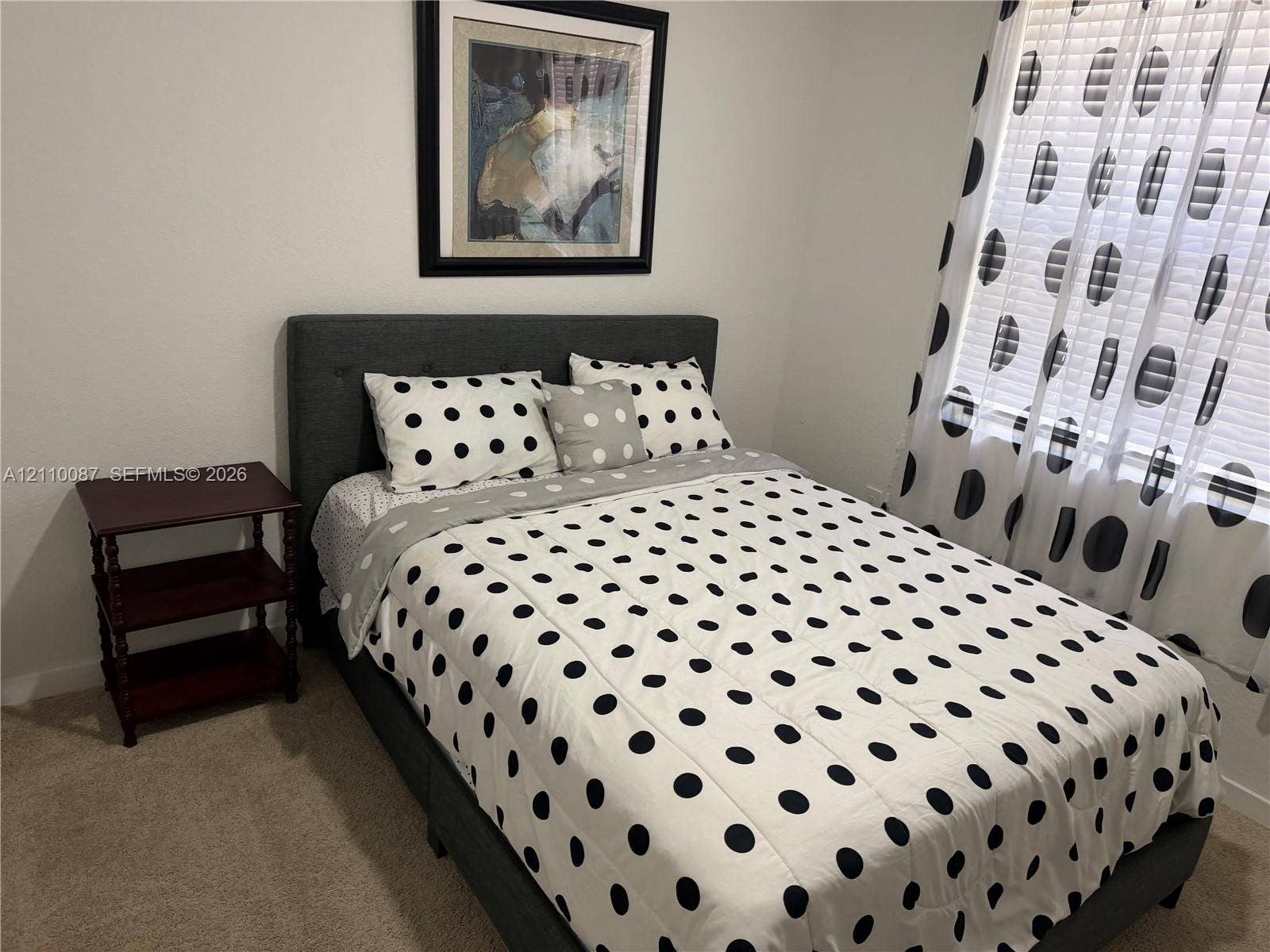 1358 NE 3rd Avenue, #1, Florida City, Florida City, FL 33034 Neutral-toned carpeted flooring and window treatments