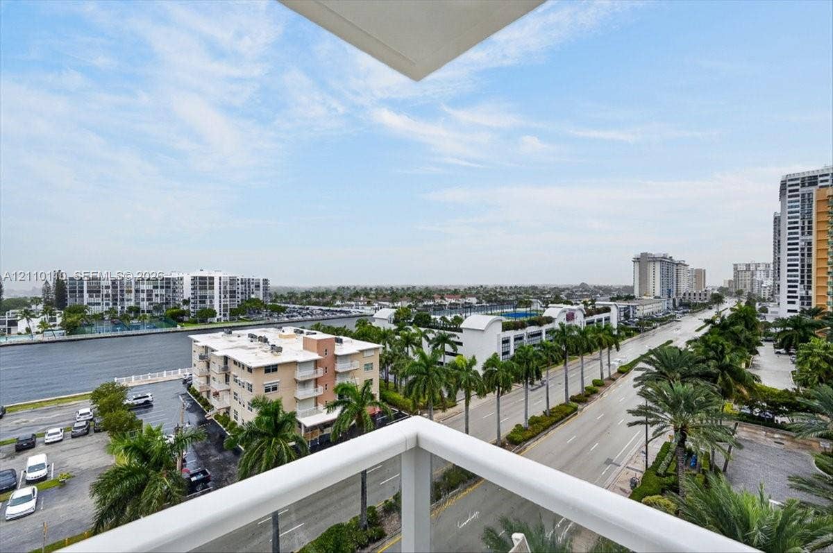 2751 S Ocean Drive, #801N, Hollywood, FL 33019 Private balcony featuring white metal railings and expansive city and water surroundings