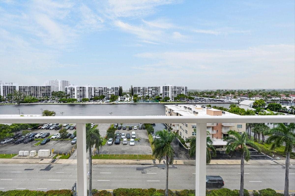 2751 S Ocean Drive, #801N, Hollywood, FL 33019 Elevated balcony featuring a white metal railing overlooking a waterway and urban landscape