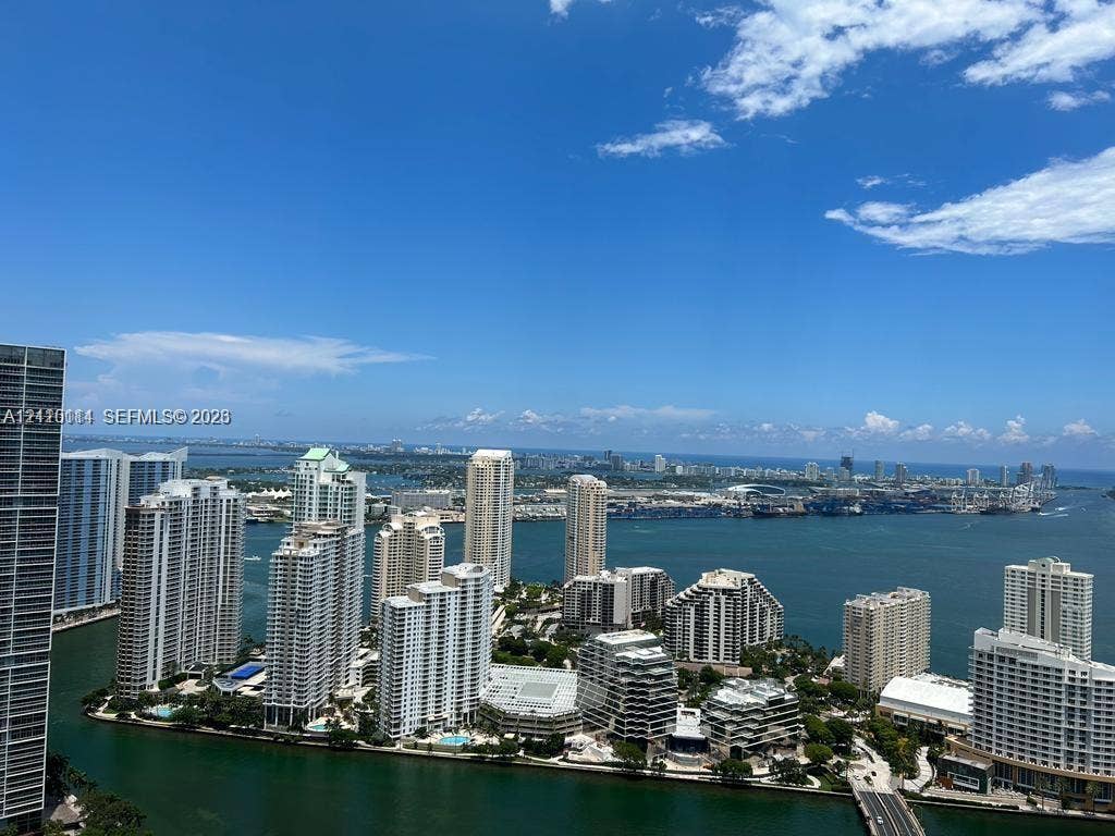 950 Brickell Bay Drive, #5108, Miami, Miami, FL 33131 High-altitude perspective featuring expansive water frontage, coastal scenery, and a panoramic urban skyline
