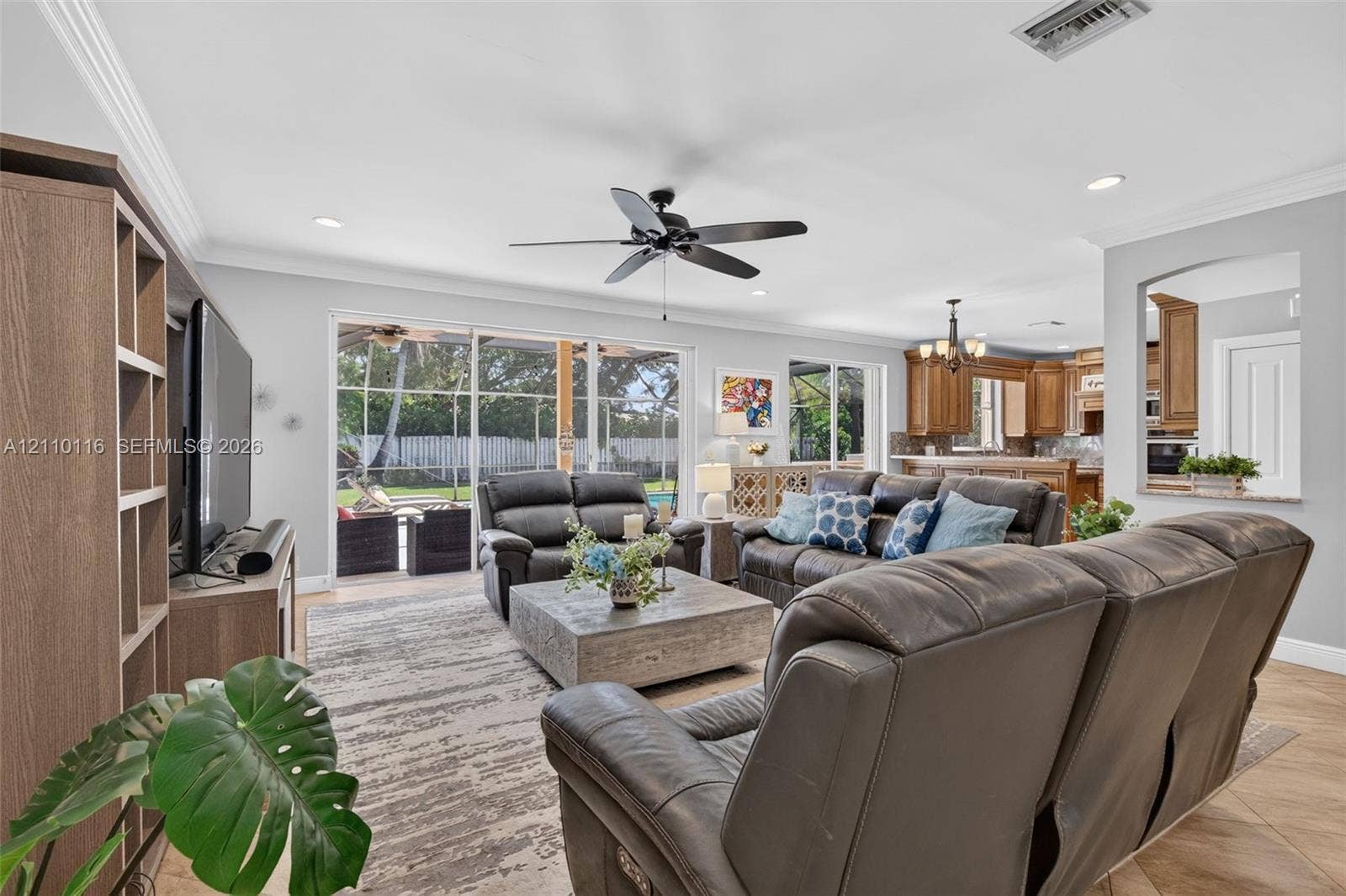 Large sliding glass doors to patio & Pool