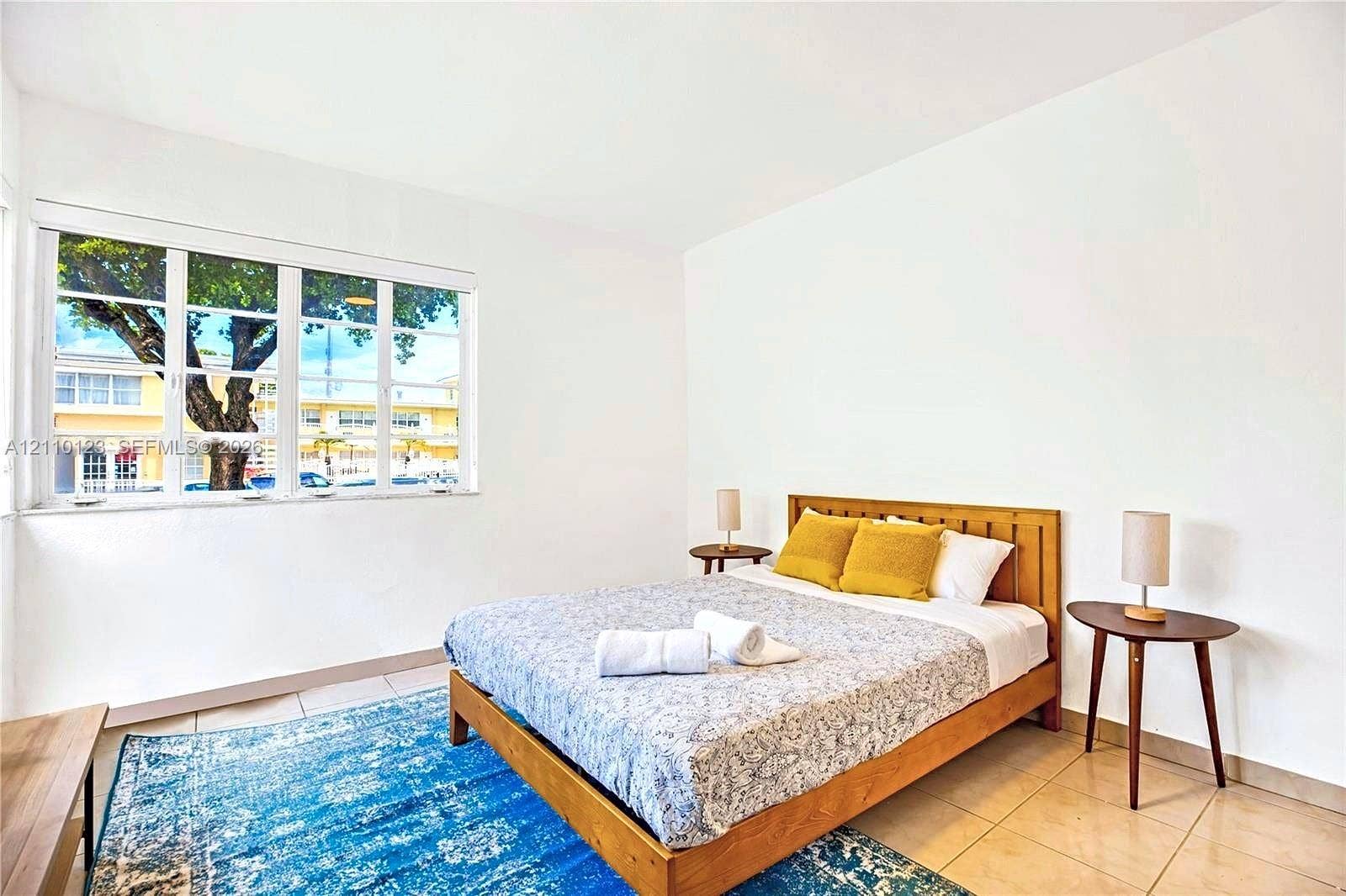 301 86th Street, #303-3, Miami Beach, Miami Beach, FL 33141 Interior space featuring large multi-pane windows and tile flooring