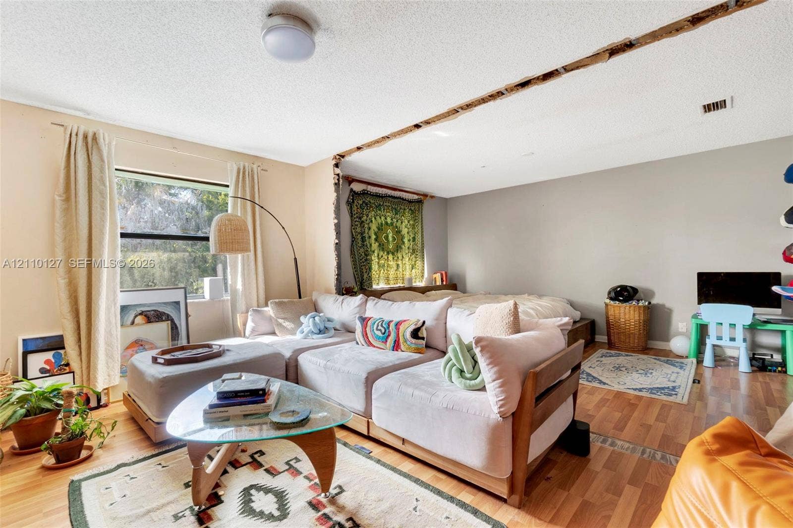 10164 SW 52nd Street, Cooper City, FL 33328 Wood-finish flooring and a single-pane window