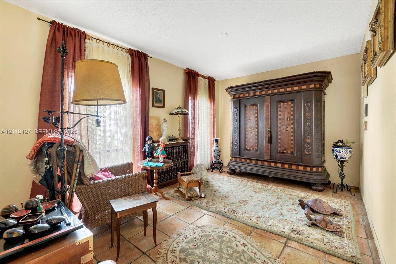 10164 SW 52nd Street, Cooper City, FL 33328 Interior room featuring dual floor-to-ceiling windows and terra-cotta tile flooring