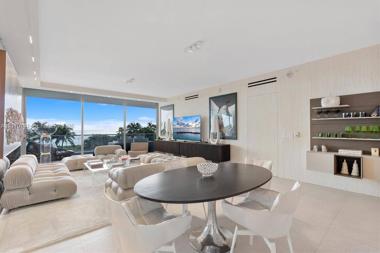 10203 Collins Avenue, #303, Bal Harbour, FL 33154 Open-concept living space. custom built ins