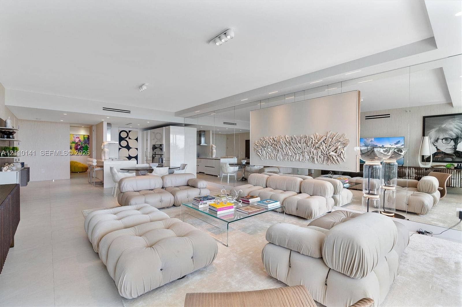 10203 Collins Avenue, #303, Bal Harbour, FL 33154 Open-concept interior wall-to-wall mirrored back wall
