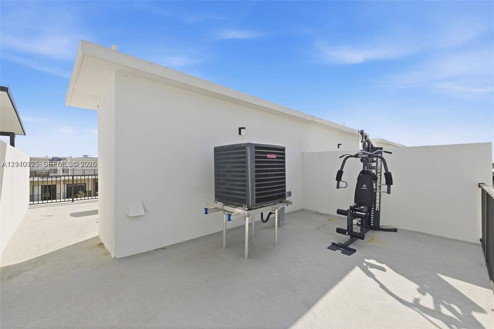 26122 SW 145th Court, #26122, Homestead, Homestead, FL 33032 Rooftop terrace featuring smooth concrete flooring, solid perimeter walls, and metal railings