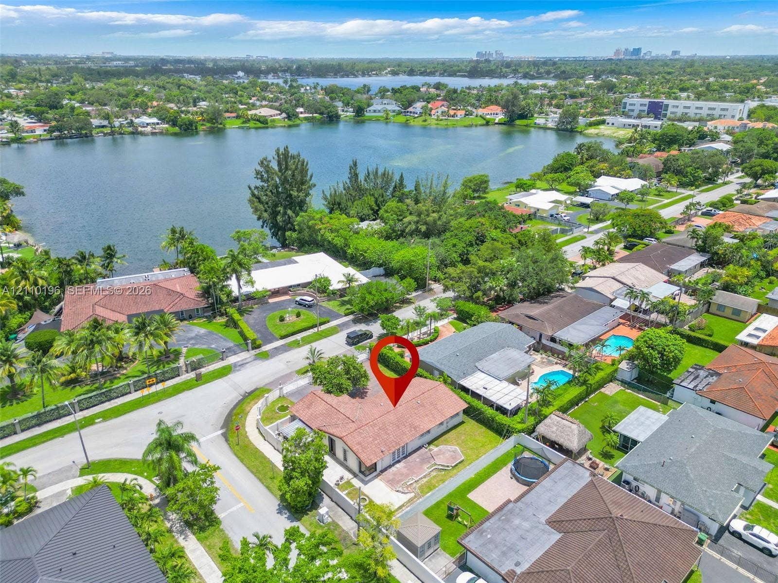 4400 SW 89th Avenue, #4400, Miami, Miami, FL 33165 Aerial perspective featuring a shingle-style roof, corner lot placement, and proximity to a lakefront