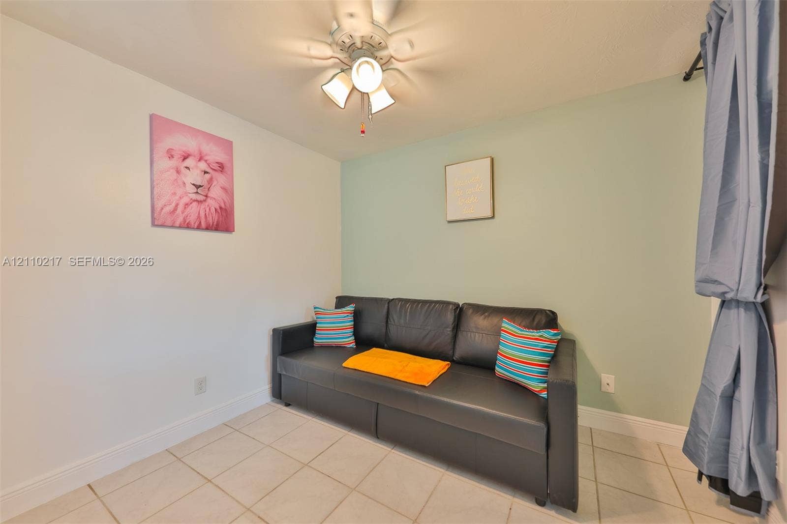 503 SW 17 Street, Cape Coral, FL 33990 Ceramic tile flooring and a multi-bulb ceiling fan with an integrated light fixture