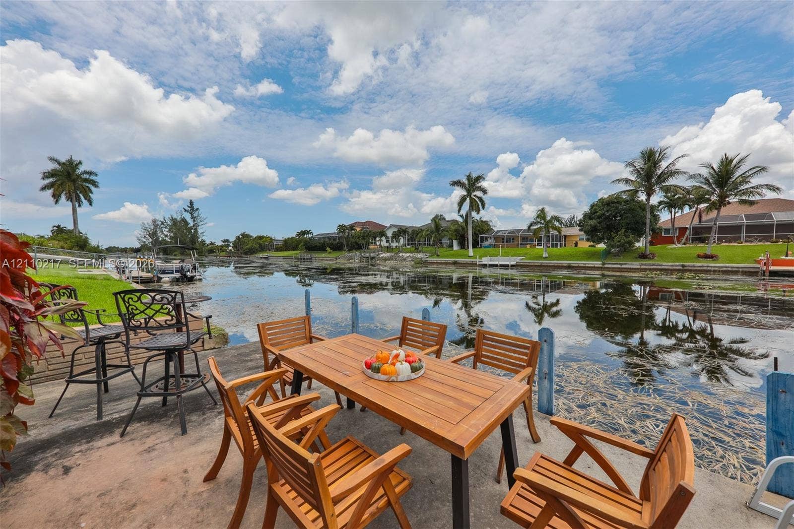 503 SW 17 Street, Cape Coral, FL 33990 Waterfront concrete terrace featuring direct canal access and expansive water scenery