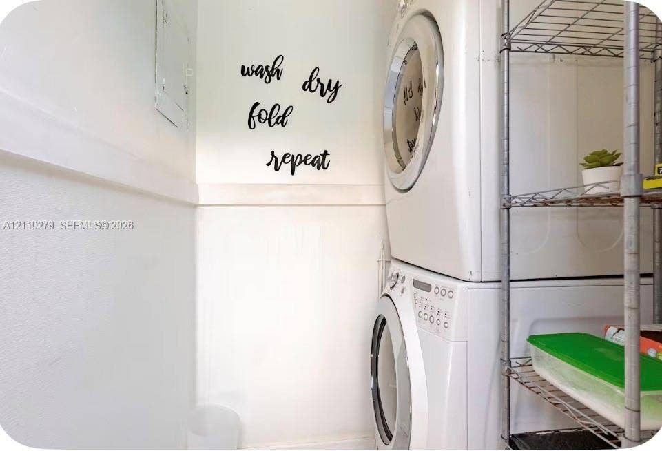 Stacked laundry unit with front-loading appliances