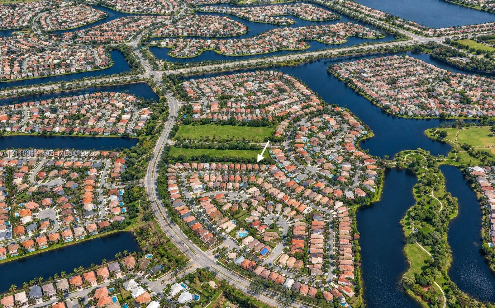 17731 SW 23rd Street, Miramar, FL 33029 Aerial perspective of a residential community featuring winding waterways and structured suburban layout