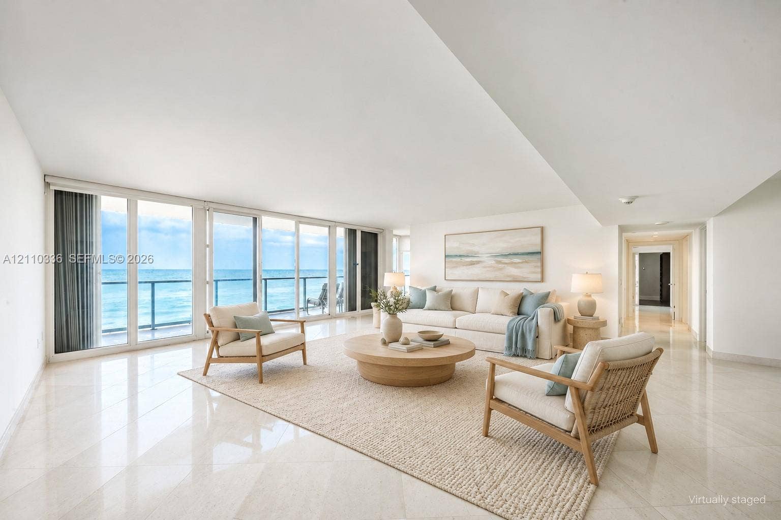 16445 Collins Avenue, #WS-7B, Sunny Isles Beach, Sunny Isles Beach, FL 33160 Open-concept interior featuring polished tile flooring, floor-to-ceiling glass panel sliding doors, and a private balcony