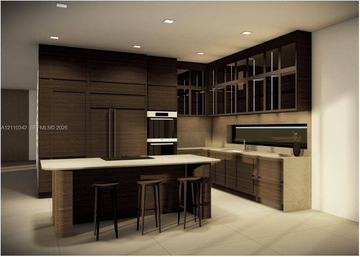 1030 NW 9th Court, Miami, FL 33136 Modern kitchen featuring dark wood-finish cabinetry, floor-to-ceiling integrated appliance paneling, recessed lighting, stone-finish countertops, and an island with an extended counter