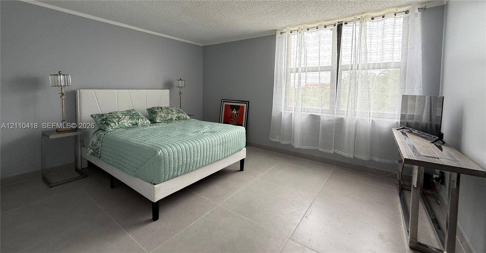 950 Egret Circle, #5409, Delray Beach, Delray Beach, FL 33444 Large-format tile flooring, neutral wall tones, and expansive horizontal window featuring natural light