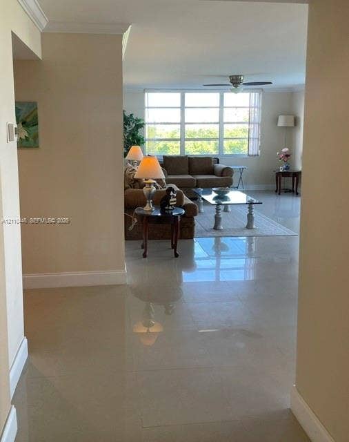 2780 NE 183rd Street, #517, Aventura, FL 33160 Neutral tile flooring, large multi-pane windows, and a ceiling fan