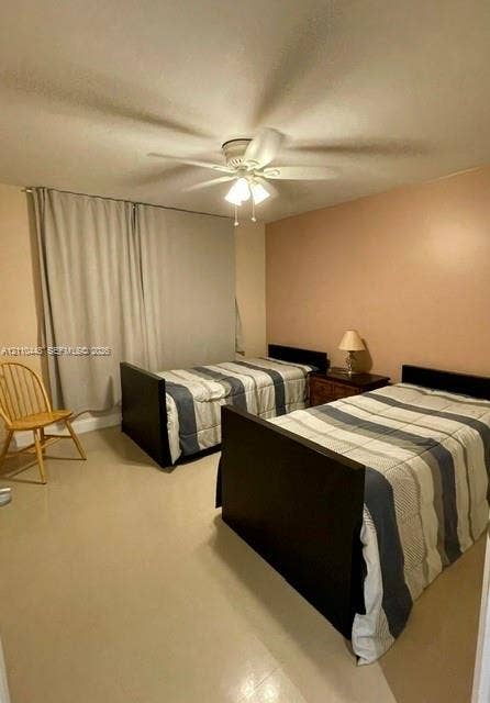 2780 NE 183rd Street, #517, Aventura, FL 33160 Room featuring neutral wall paint, smooth-finish ceiling, and ceiling-mounted light fixture with a central fan