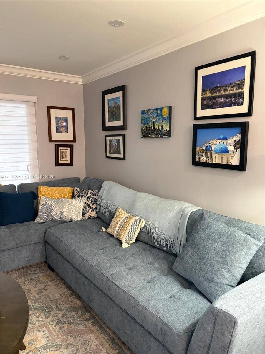 13255 SW 16th Court, #K112, Pembroke Pines, FL 33027 Neutral wall color, crown molding, recessed lighting, and window blinds