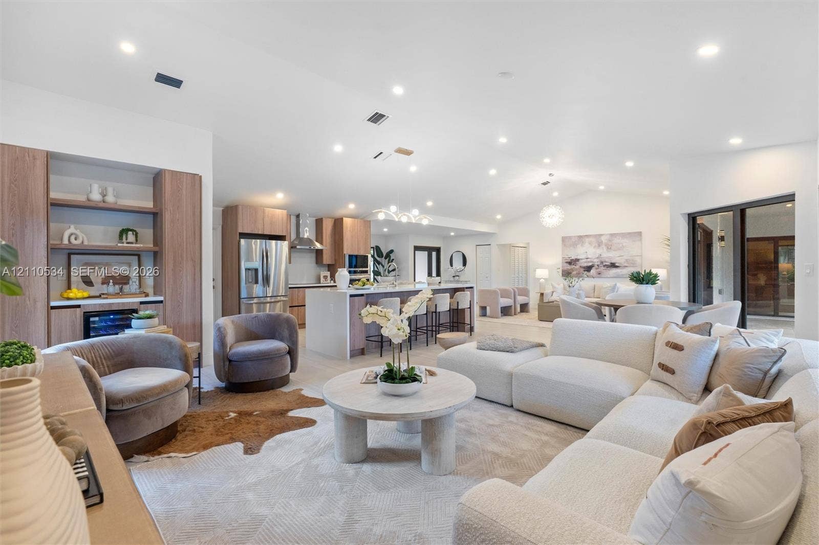 Open-concept living space and bar