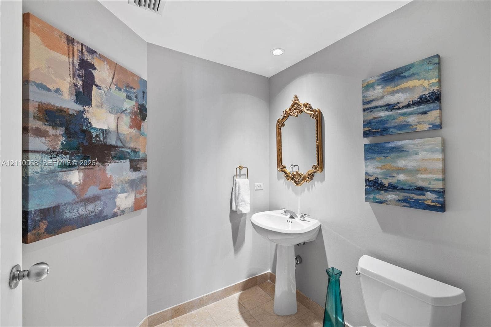 801 Brickell Key Boulevard, #2006, Miami, FL 33131 Pedestal sink with polished chrome faucet, tile flooring, and recessed lighting