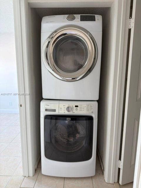 2297 SW 15th Street, #125, Deerfield Beach, Deerfield Beach, FL 33442 Stacked, front-loading washer and dryer unit housed in a dedicated closet