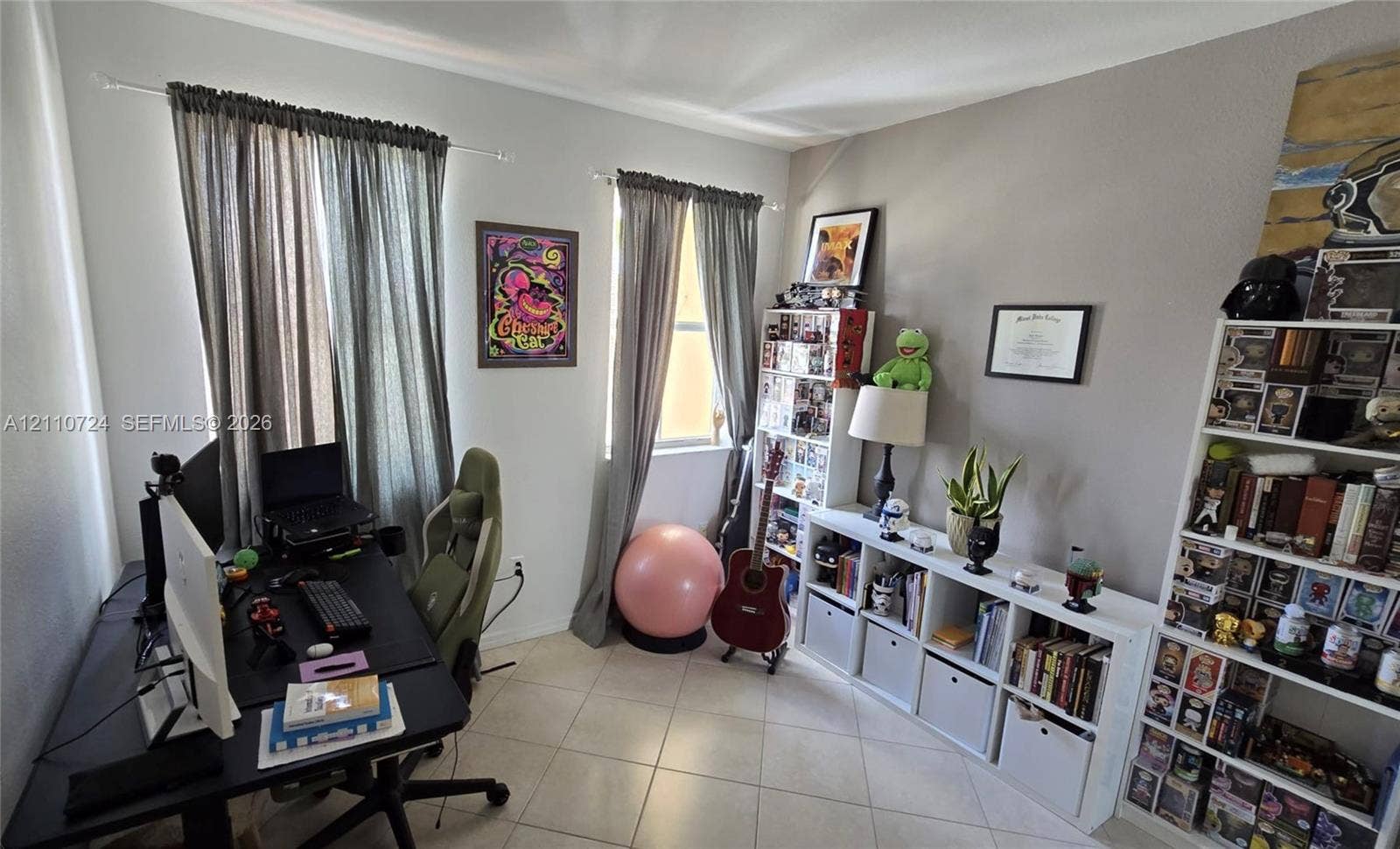 10846 SW 240th Lane, Homestead, FL 33032 Neutral-toned interior space featuring light-colored tile flooring and dual windows