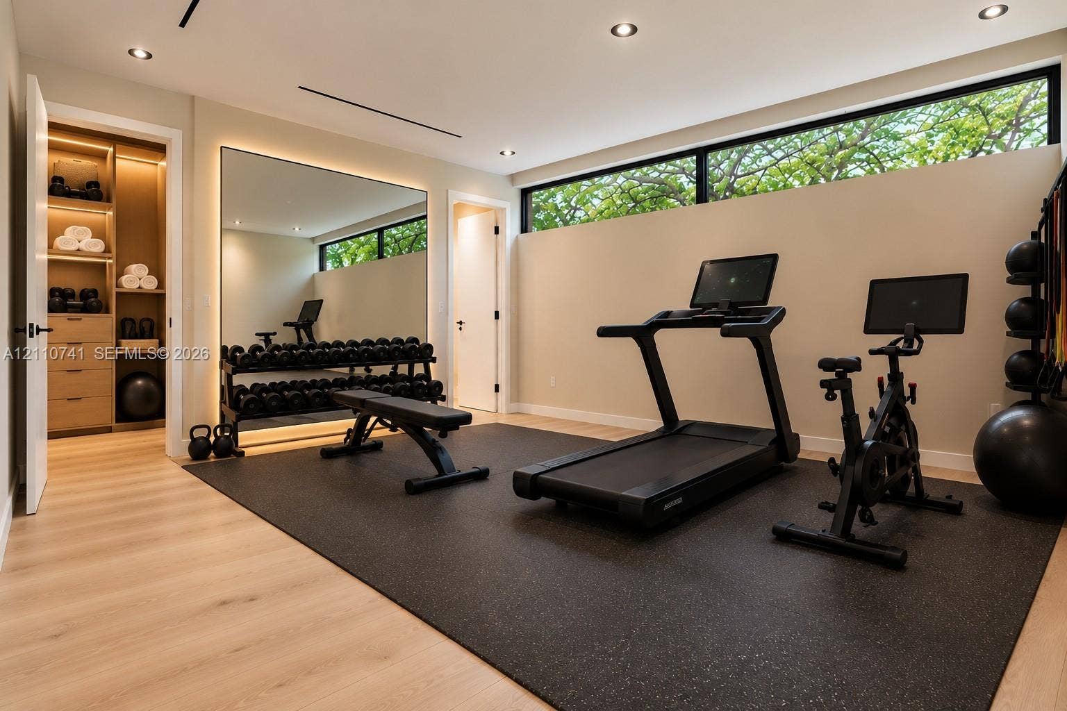 9445 SW 73rd Avenue, Pinecrest, FL 33156 bedroom with en-suite/ gym virtually staged for illustrative purposes