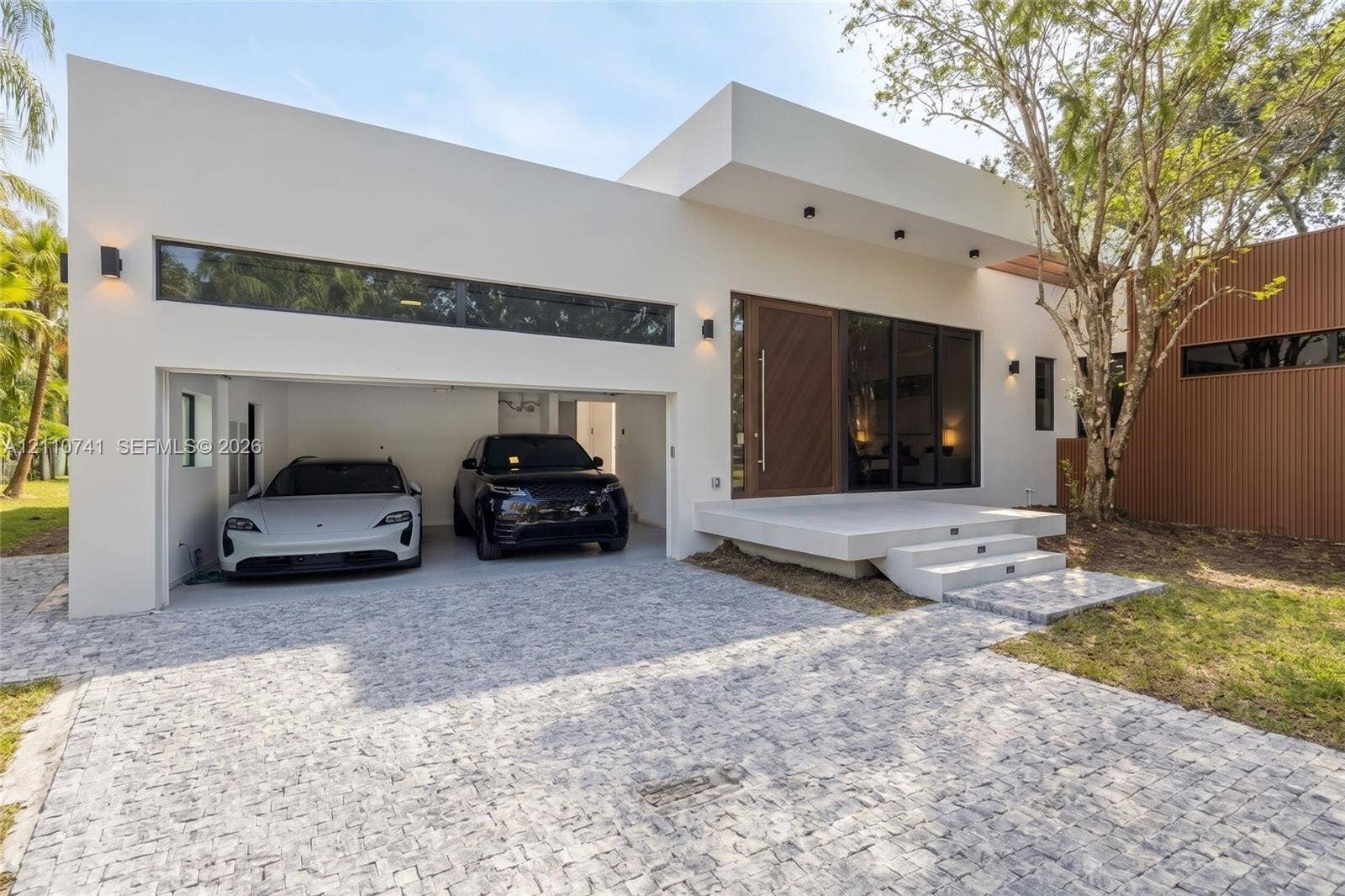 9445 SW 73rd Avenue, Pinecrest, FL 33156 Two-car garage with space for lift