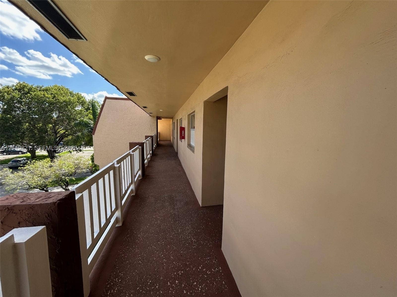 9020 Sunrise Lakes Boulevard, #303, Sunrise, FL 33322 Walkway to unit