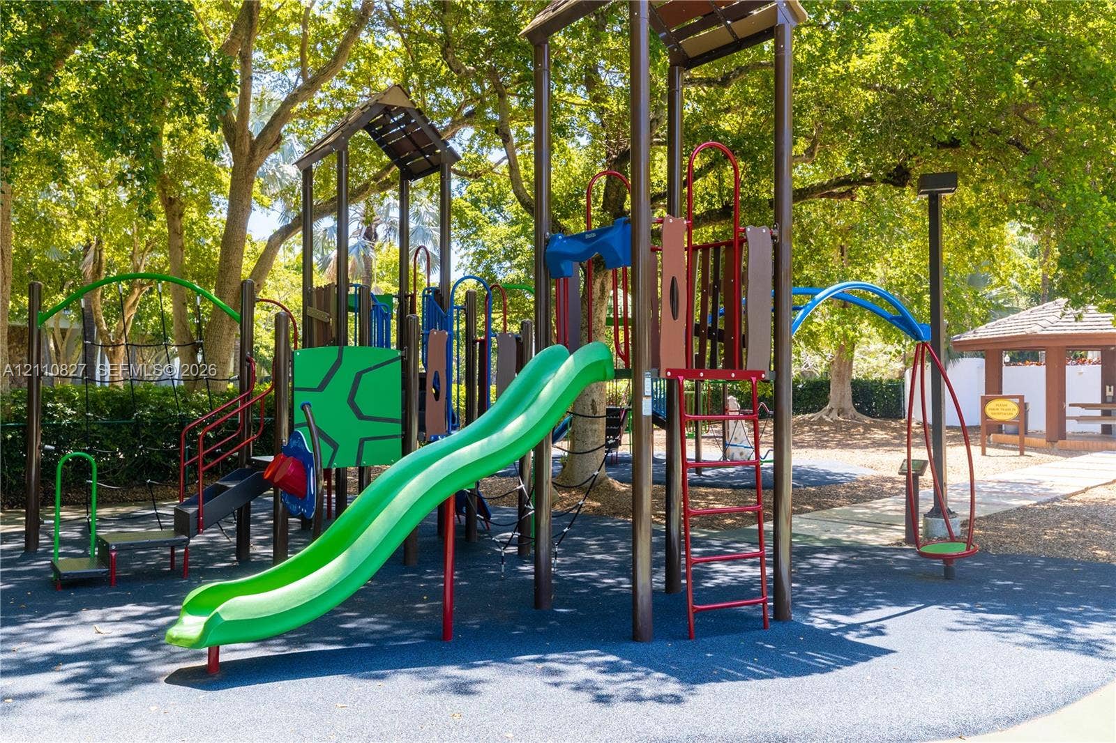4000 Towerside Terrace, #908, Miami, Miami, FL 33138 Outdoor recreation area featuring a multi-level playground structure, integrated slide, climbing apparatus, and protective rubberized flooring
