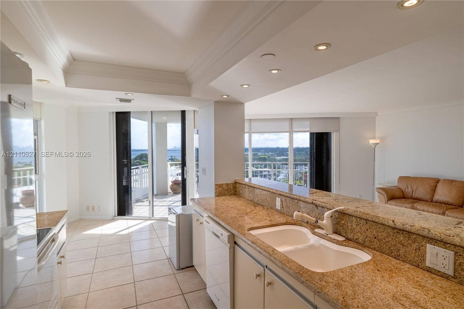 4000 Towerside Terrace, #908, Miami, Miami, FL 33138 Kitchen featuring stone countertops, a dual-basin undermount sink, white cabinetry, tile flooring, and recessed ceiling lighting