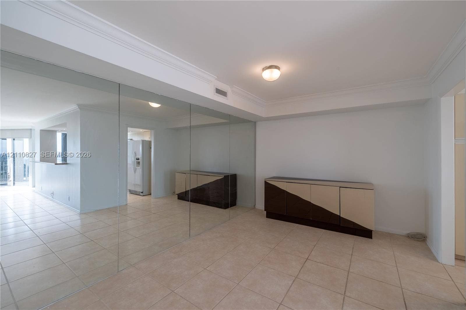 4000 Towerside Terrace, #908, Miami, Miami, FL 33138 Full-wall mirror installation, ceramic tile flooring, and crown molding