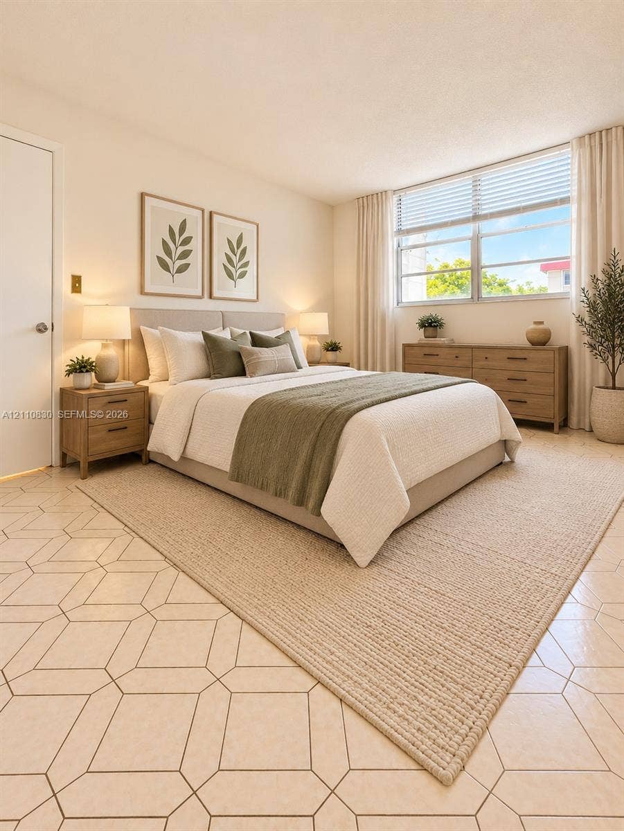 STAGED Geometric patterned tile flooring, expansive horizontal window with integrated blinds, and neutral wall tones
