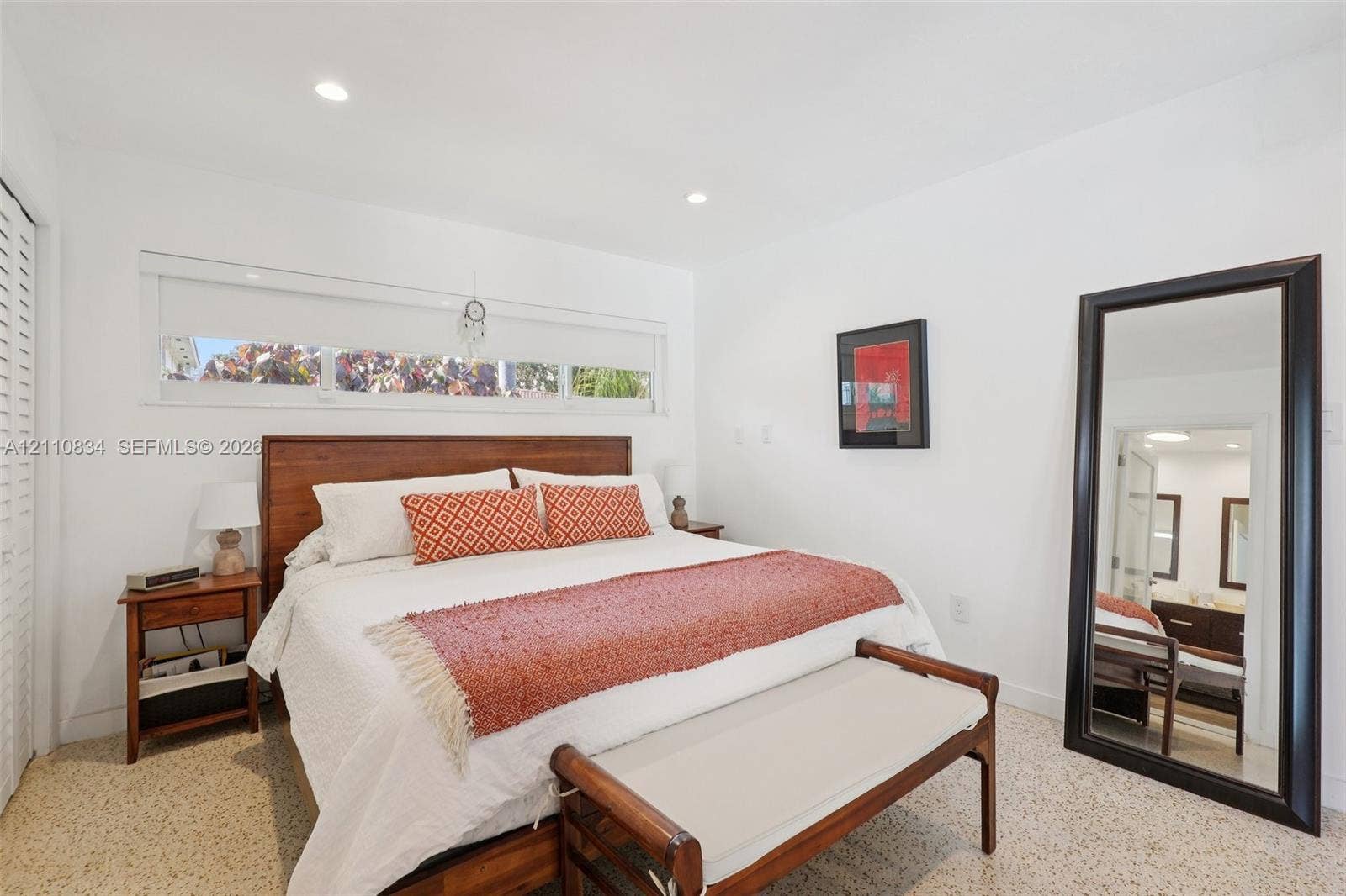 4120 SW 15th Street, Miami, FL 33142 Bedroom featuring recessed lighting, horizontally oriented clerestory windows, and light-toned terrazzo flooring