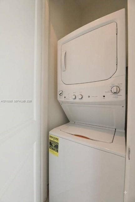 17552 SW 46th Street, Miramar, Miramar, FL 33029 Stacked white laundry unit with dial controls and enclosed alcove setting