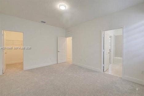 17552 SW 46th Street, Miramar, Miramar, FL 33029 Neutral-toned carpeting, flush-mount ceiling lighting, interior panel doors, and walk-in storage space