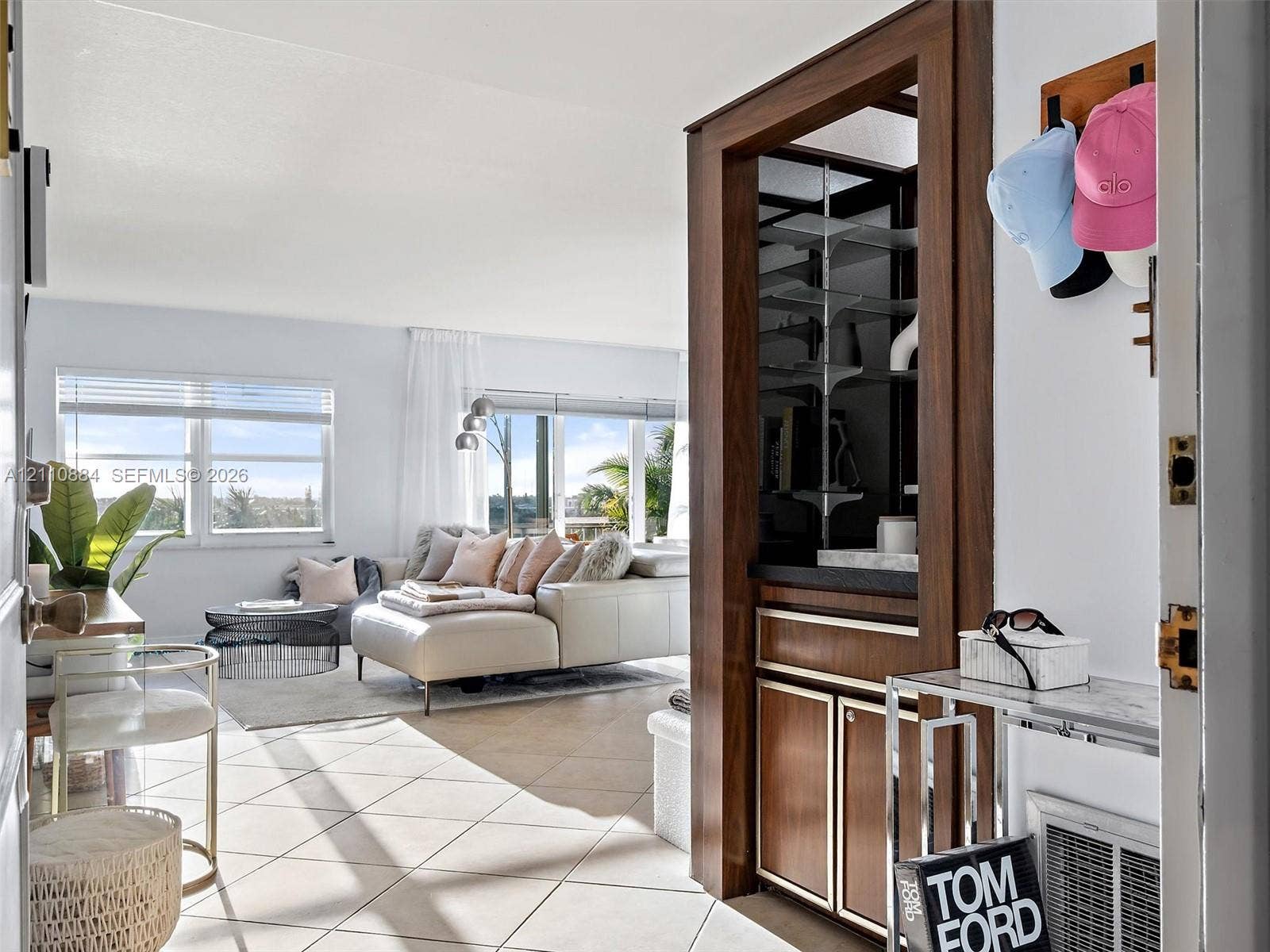 400 Diplomat Parkway, #805, Hallandale Beach, FL 33009 Open concept entry with lighted bar nook showcasing views on views