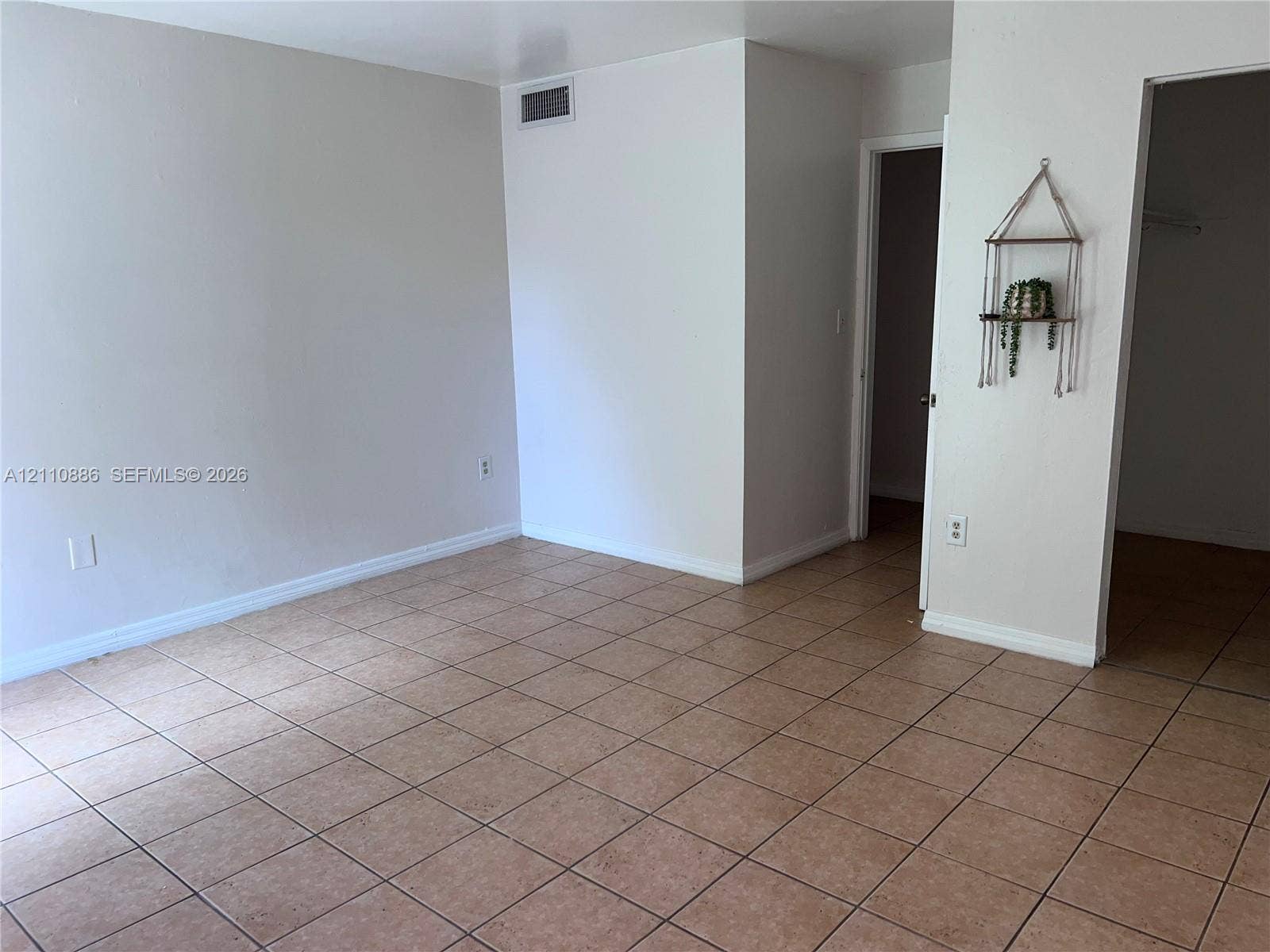 7101 Miami Lakes Drive, #Q12, Miami Lakes, Miami Lakes, FL 33014 Interior room featuring neutral wall paint and tile flooring