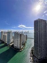 High-rise urban landscape featuring waterfront property, prominent high-rise architecture, and expansive marine frontage