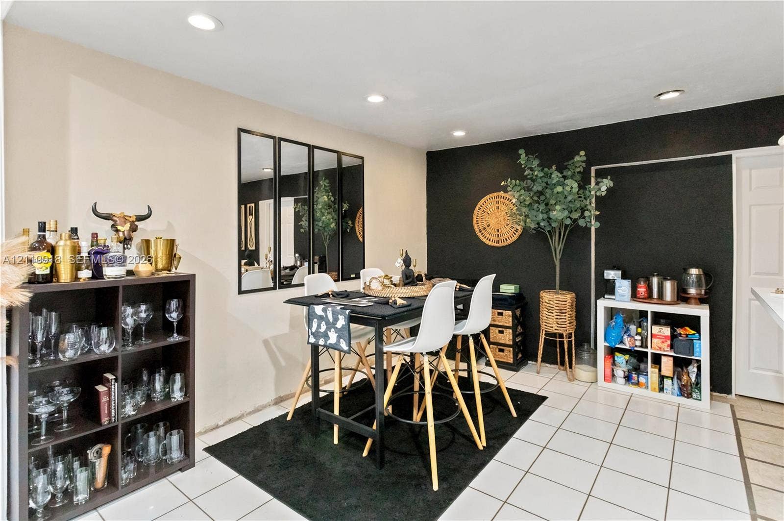 2007 NW 89th Street, Miami, FL 33147 Ceramic tile flooring, recessed ceiling lighting, and a multi-panel wall mirror
