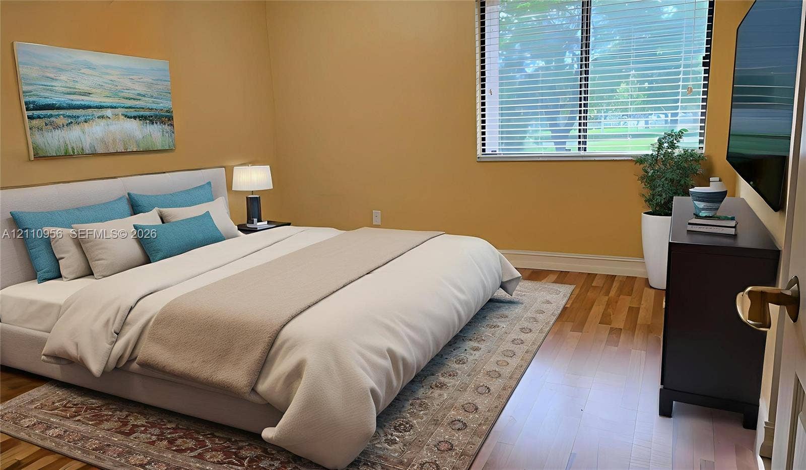 2120 SW 94th Terrace, #404, Davie, FL 33324 Wood-finish flooring and a multi-pane window with horizontal blinds