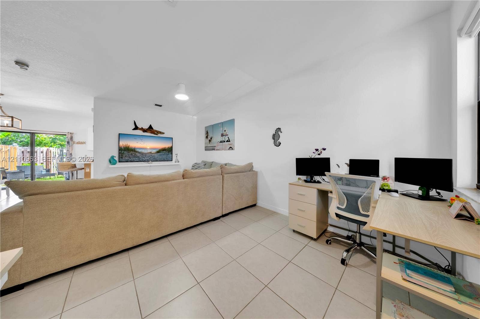 23436 SW 129th Avenue, #23436, Homestead, Homestead, FL 33032 Neutral-toned tile flooring, white wall finish, and sliding glass door with exterior access