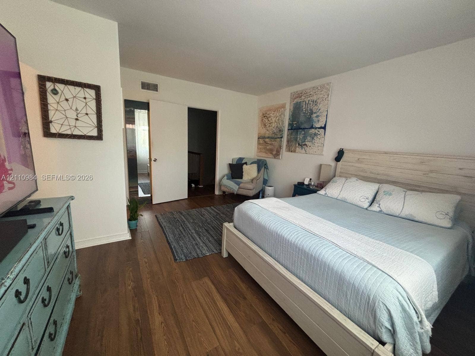 3745 NE 171st Street, #77, North Miami Beach, North Miami Beach, FL 33160 Spacious interior featuring wood-finish flooring and smooth-finish walls