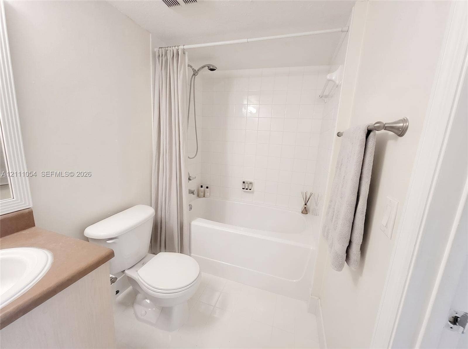 4180 San Marino Boulevard, #106, West Palm Beach, FL 33409 virtually staged