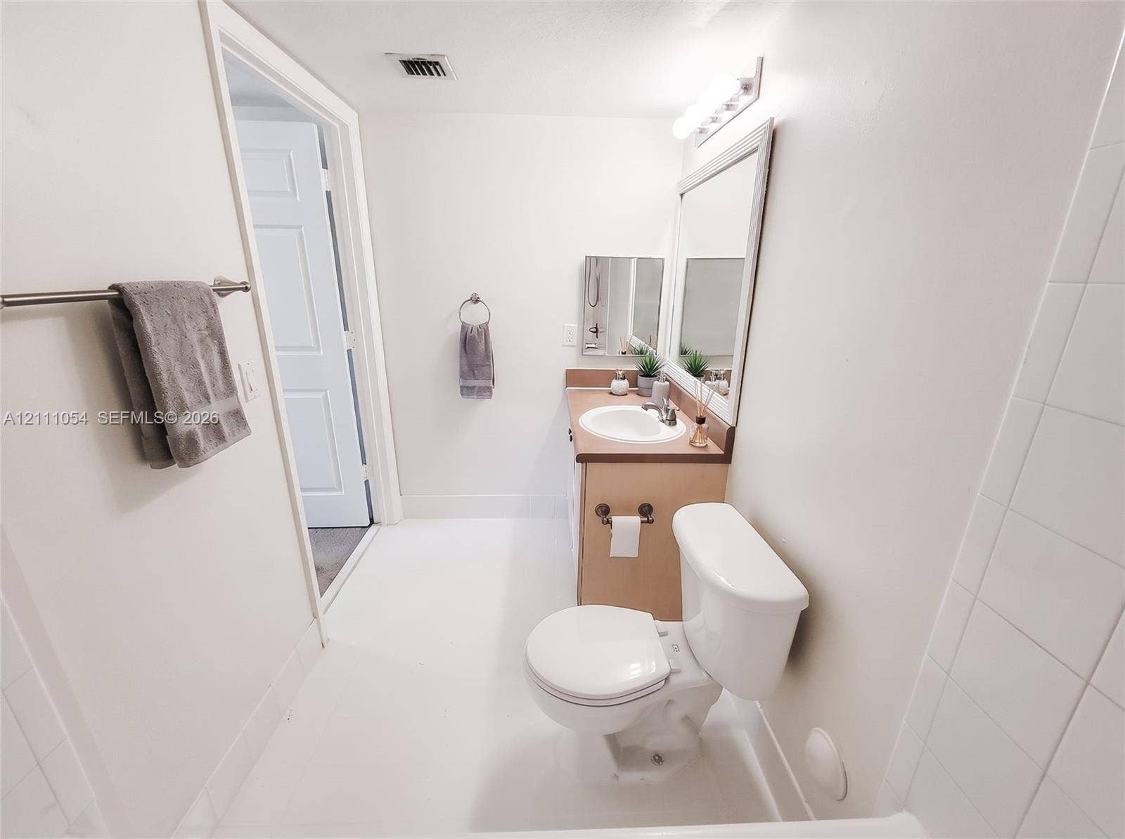 4180 San Marino Boulevard, #106, West Palm Beach, FL 33409 virtually staged
