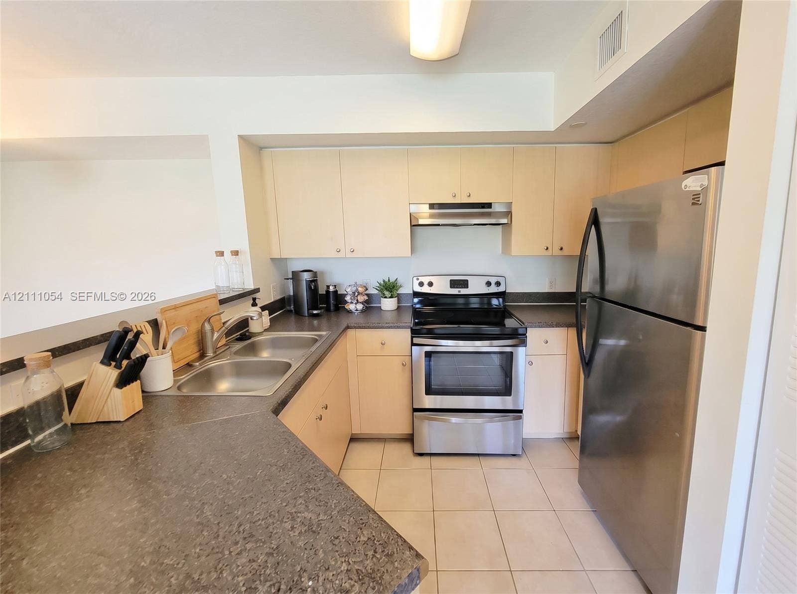 4180 San Marino Boulevard, #106, West Palm Beach, FL 33409 virtually staged